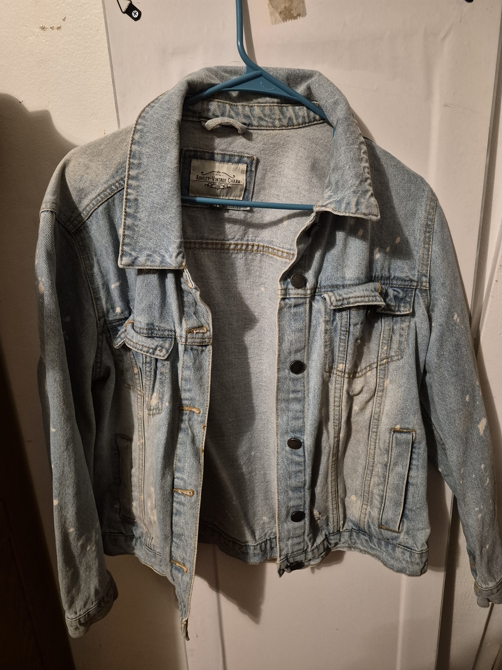 Light Wash Denim Jacket with Subtle Paint Splatter